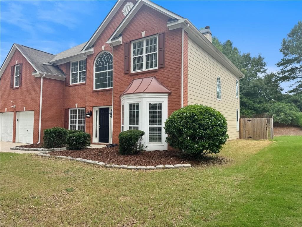 4 bedroom, 3 bathroom, 3,019 sq ft single family residence for sale at 400 Fitzgerald Place, College Park, GA 30349 — photo 2