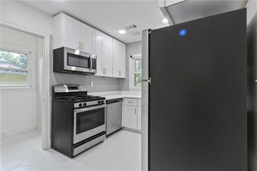 3 bedroom, 2 bathroom, 1,148 sq ft single family residence for sale at 1707 Mckenzie Drive, Decatur, GA 30032 — photo 8