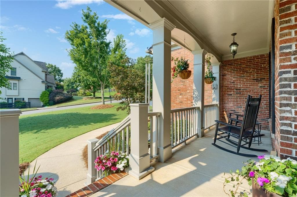 6 bedroom, 5 bathroom, 5,255 sq ft single family residence for sale at 5680 Cascade Trail, Cumming, GA 30040 — photo 4