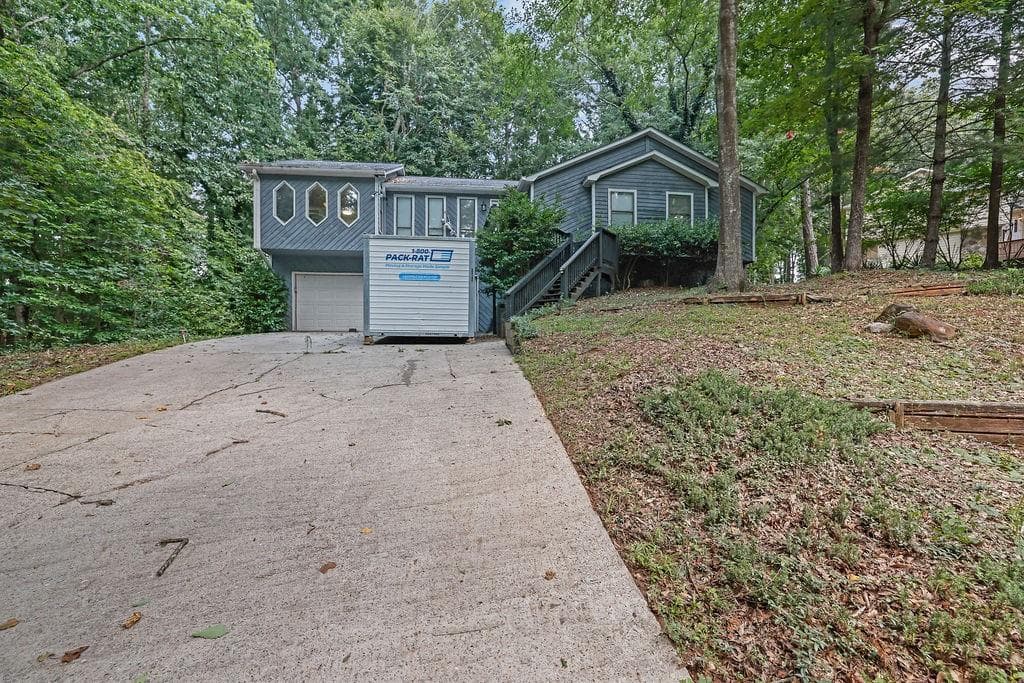 3 bedroom, 2 bathroom, 2,552 sq ft single family residence for sale at 2721 Pine Cone Lane, Duluth, GA 30096 — photo 1 of 30