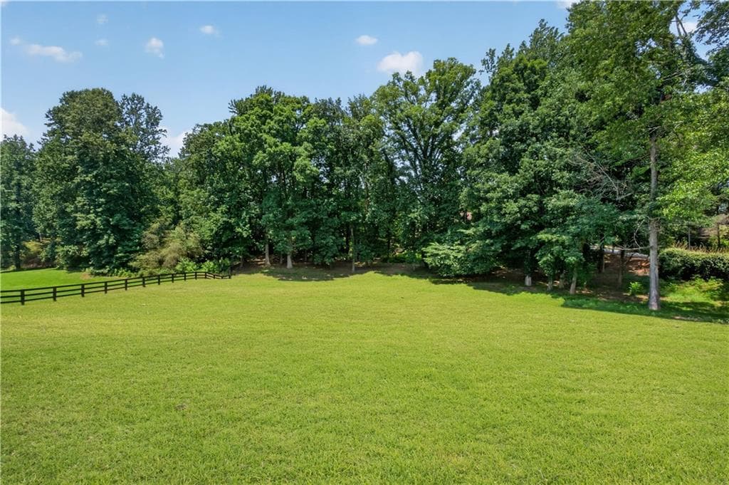 5 bedroom, 5 bathroom, 6,425 sq ft single family residence for sale at 775 Champions Club Drive, Milton, GA 30004 — photo 4