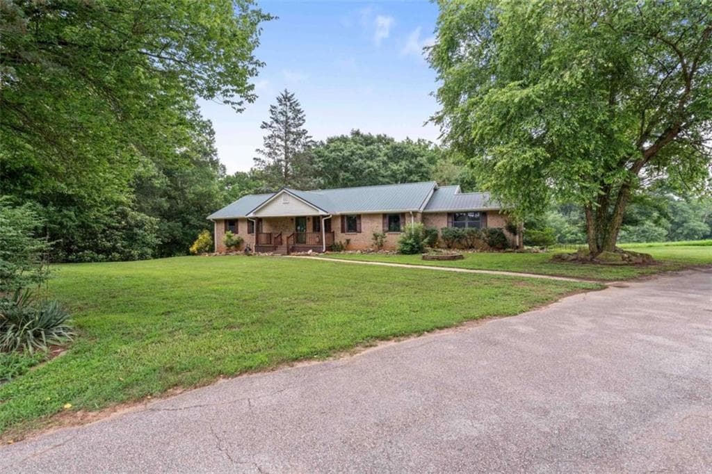 3 bedroom, 2 bathroom, 3,722 sq ft single family residence for sale at 2414 Bethesda Church Road, Carrollton, GA 30117 — photo 2