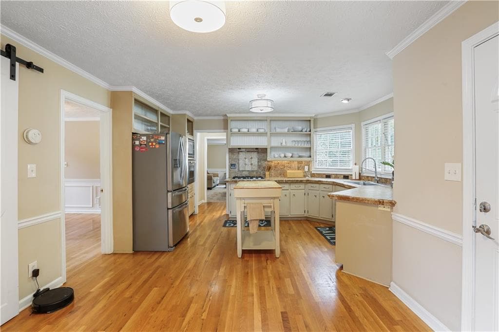 4 bedroom, 3 bathroom, 2,484 sq ft single family residence for sale at 1575 Thoreau Drive, Suwanee, GA 30024 — photo 9