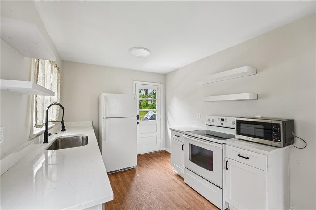 3 bedroom, 1 bathroom, 964 sq ft single family residence under contract at 1040 McLinden Avenue, Smyrna, GA 30080 — photo 7