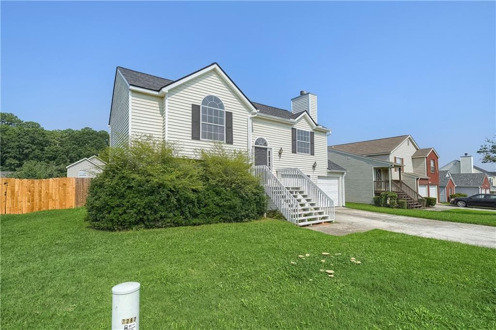 4 bedroom, 2 bathroom, 1,477 sq ft single family residence for sale at 7281 Sandpiper Way, Riverdale, GA 30274 — photo 4