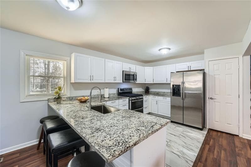 5 bedroom, 3 bathroom, 2,403 sq ft single family residence for sale at 4809 Hemlock Drive, Austell, GA 30106 — photo 8
