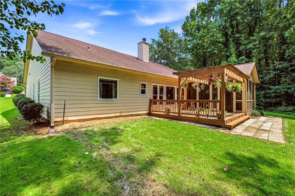 4 bedroom, 2 bathroom, 2,612 sq ft single family residence for sale at 1235 Sunhill Drive, Lawrenceville, GA 30043 — photo 6