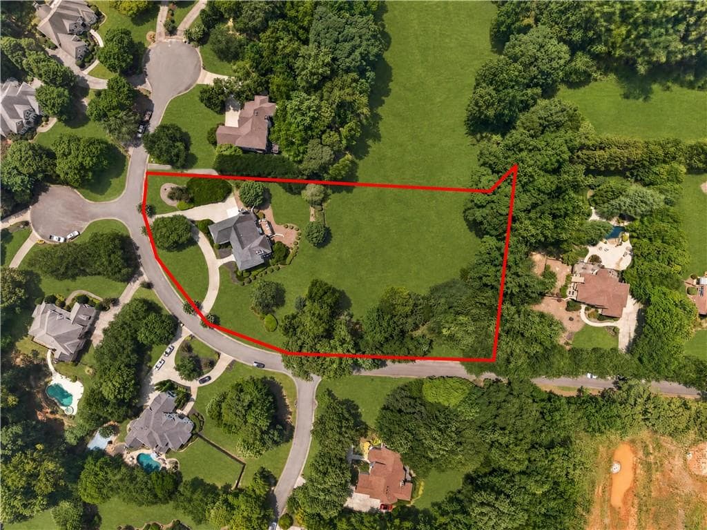 5 bedroom, 5 bathroom, 6,425 sq ft single family residence for sale at 775 Champions Club Drive, Milton, GA 30004 — photo 2