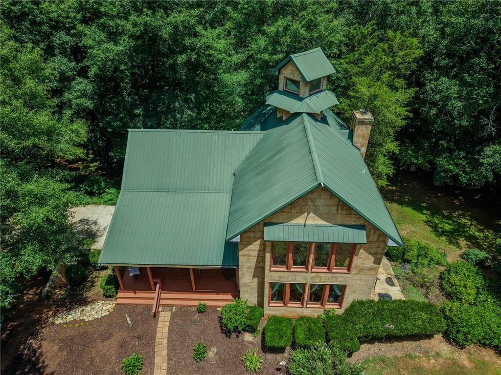 4 bedroom, 5 bathroom, 3,548 sq ft single family residence for sale at 5642 Hwy 212, Covington, GA 30016 — photo 2