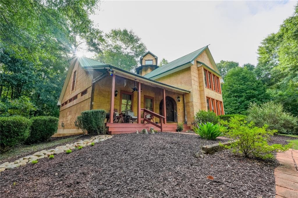 4 bedroom, 5 bathroom, 3,548 sq ft single family residence for sale at 5642 Hwy 212, Covington, GA 30016 — photo 4