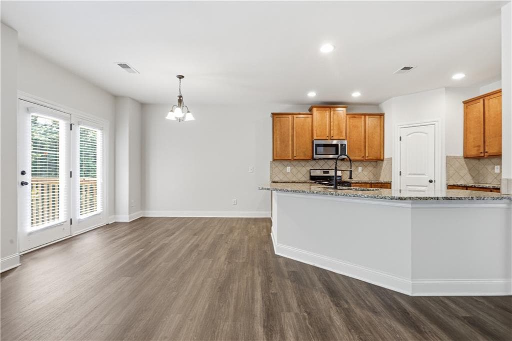 4 bedroom, 4 bathroom, 5,185 sq ft single family residence for sale at 4860 Dawson Court, Cumming, GA 30040 — photo 2