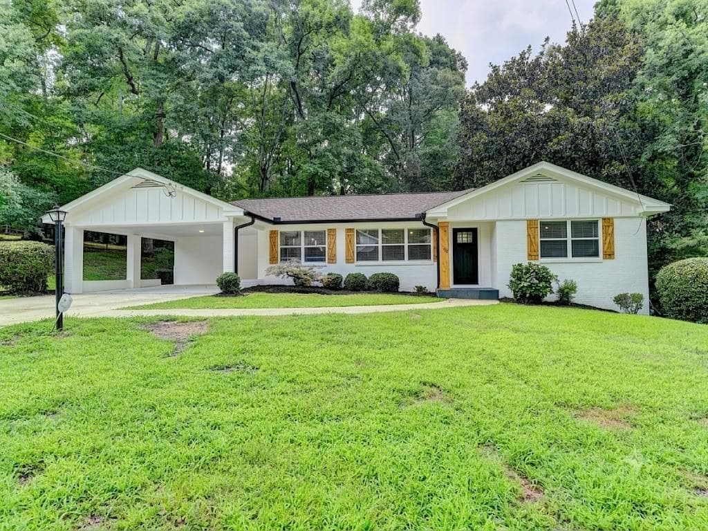 4 bedroom, 3 bathroom, 1,520 sq ft single family residence for sale at 1413 Thomas Road, Decatur, GA 30030 — photo 1 of 14