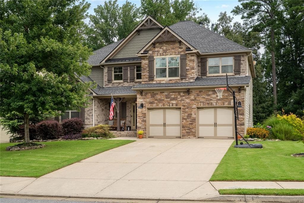 5 bedroom, 6 bathroom, 5,700 sq ft single family residence for sale at 5375 Winding Lakes Drive, Cumming, GA 30028 — photo 1 of 75