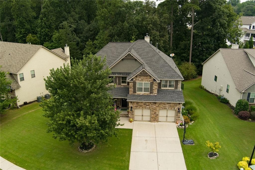 5 bedroom, 6 bathroom, 5,700 sq ft single family residence for sale at 5375 Winding Lakes Drive, Cumming, GA 30028 — photo 2