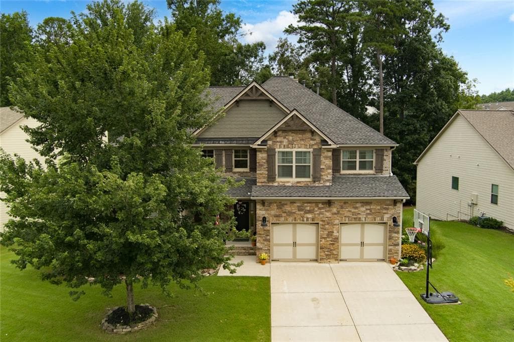 5 bedroom, 6 bathroom, 5,700 sq ft single family residence for sale at 5375 Winding Lakes Drive, Cumming, GA 30028 — photo 3