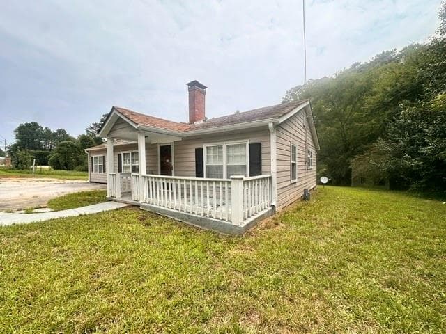3 bedroom, 2 bathroom, 1,484 sq ft single family residence for sale at 10453 Flat Shoals Road, Covington, GA 30014 — photo 2