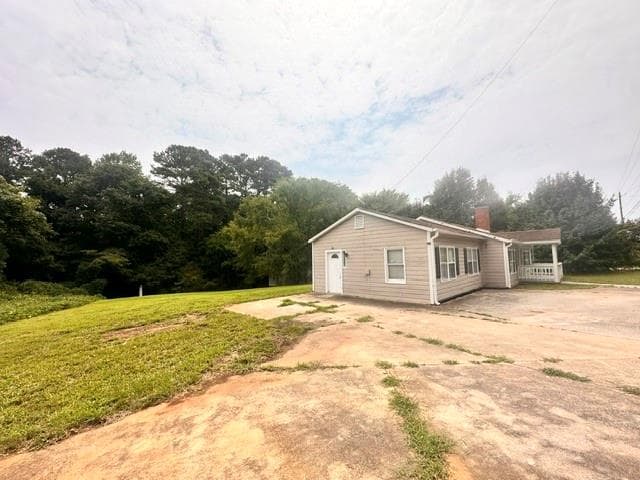 3 bedroom, 2 bathroom, 1,484 sq ft single family residence for sale at 10453 Flat Shoals Road, Covington, GA 30014 — photo 3