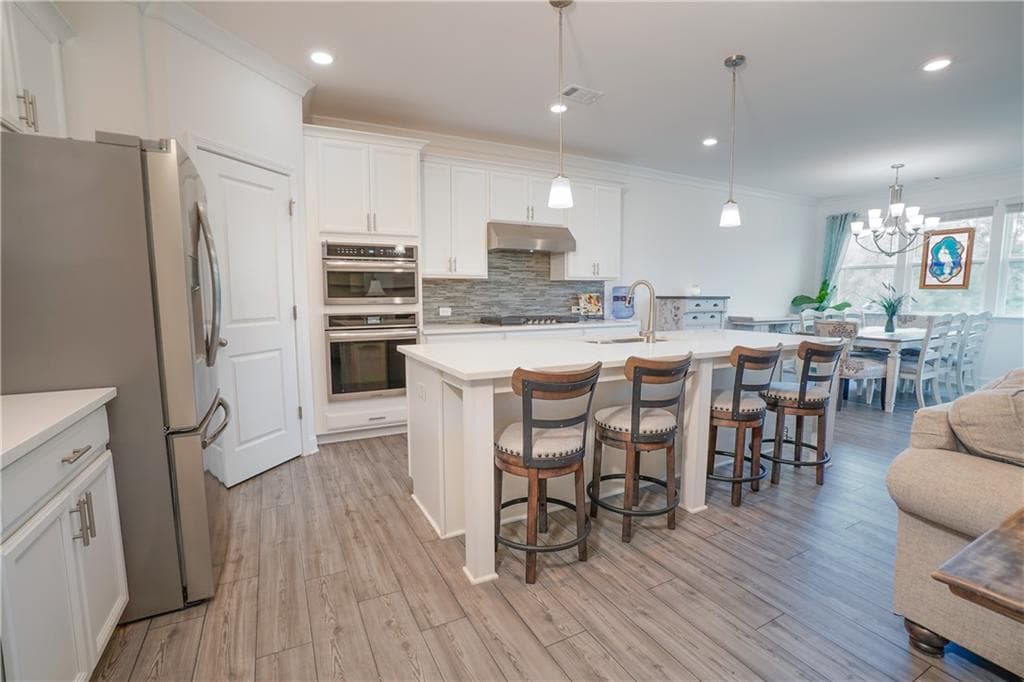 2 bedroom, 2 bathroom, 1,843 sq ft single family residence for sale at 214 Hickory Bluffs Parkway, Canton, GA 30114 — photo 4