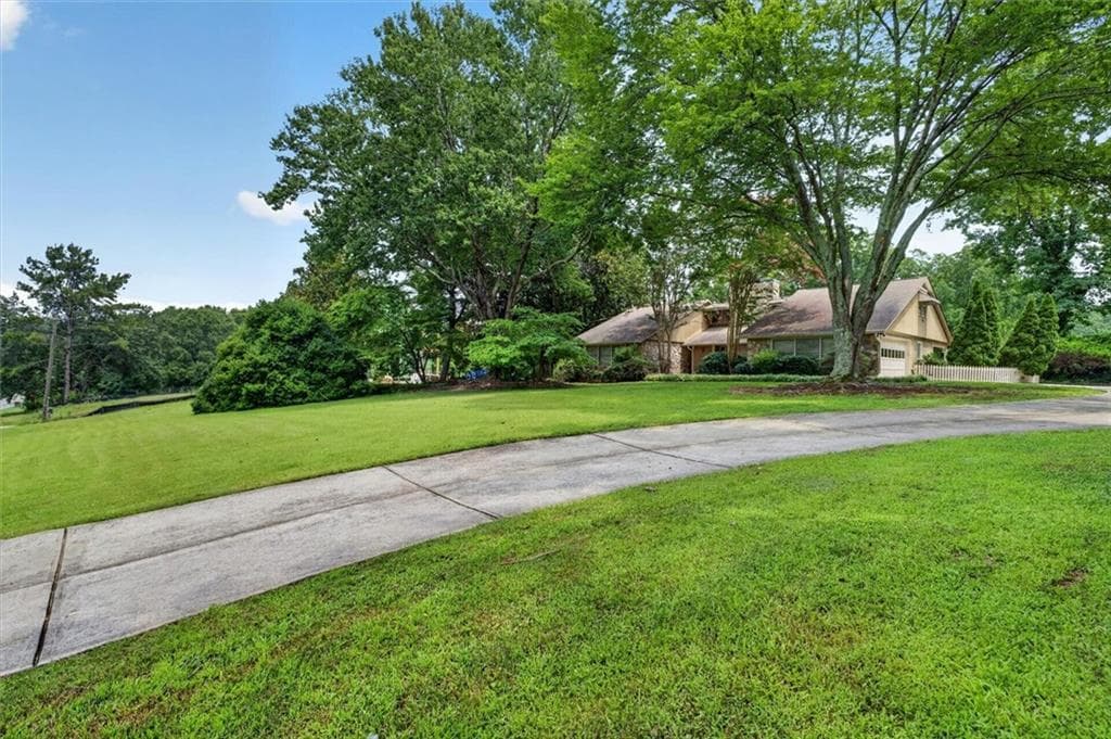 4 bedroom, 4 bathroom, 4,572 sq ft single family residence for sale at 13295 Cogburn Road, Milton, GA 30004 — photo 9