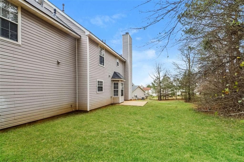 4 bedroom, 3 bathroom, 2,212 sq ft single family residence for sale at 245 Windscape Drive, Covington, GA 30016 — photo 3
