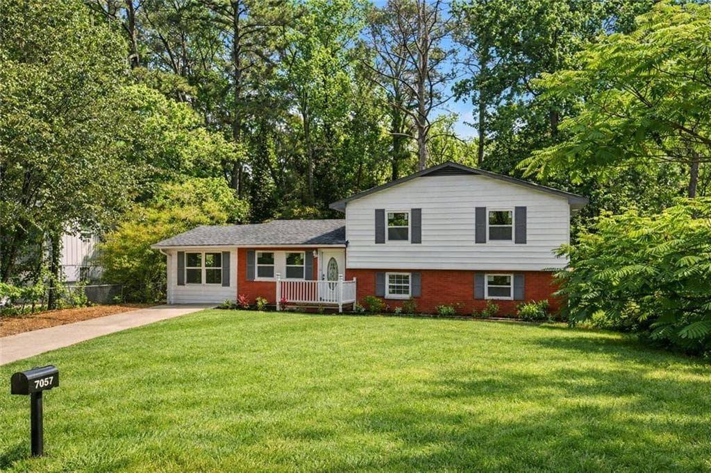 6 bedroom, 3 bathroom single family residence for sale at 7348 Mockingbird Trail, Riverdale, GA 30274 — photo 3