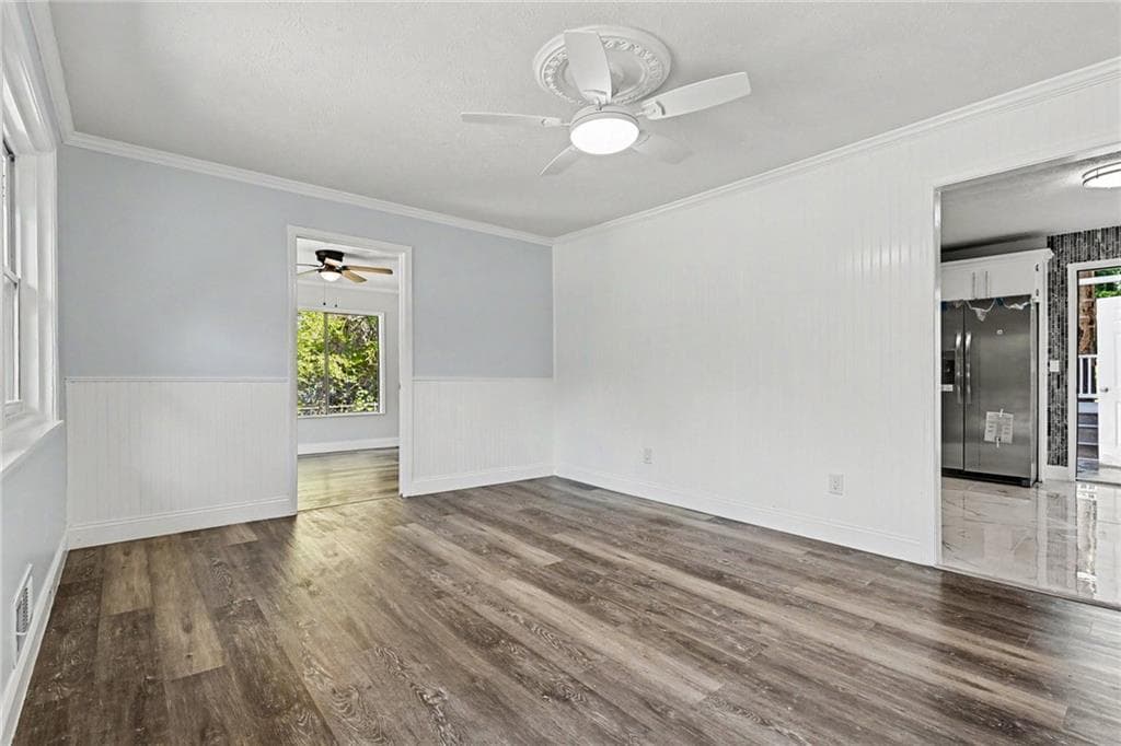 6 bedroom, 3 bathroom single family residence for sale at 7348 Mockingbird Trail, Riverdale, GA 30274 — photo 5