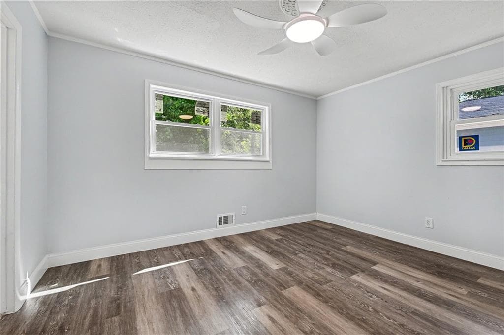6 bedroom, 3 bathroom single family residence for sale at 7348 Mockingbird Trail, Riverdale, GA 30274 — photo 8
