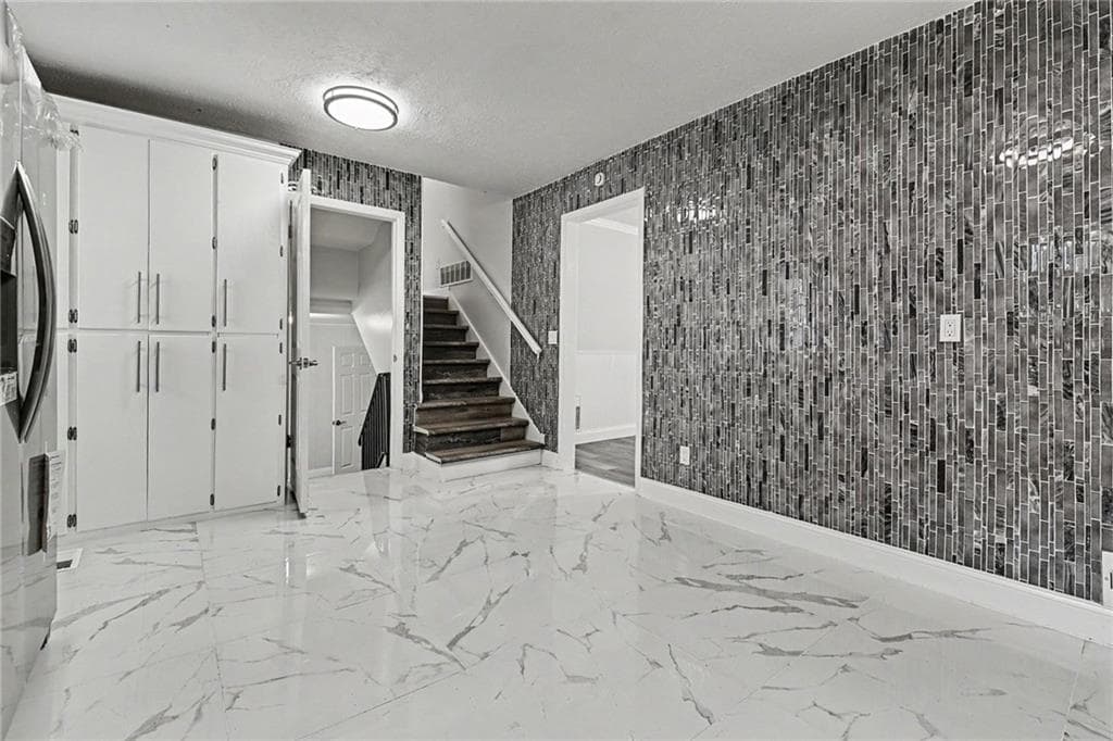 6 bedroom, 3 bathroom single family residence for sale at 7348 Mockingbird Trail, Riverdale, GA 30274 — photo 10