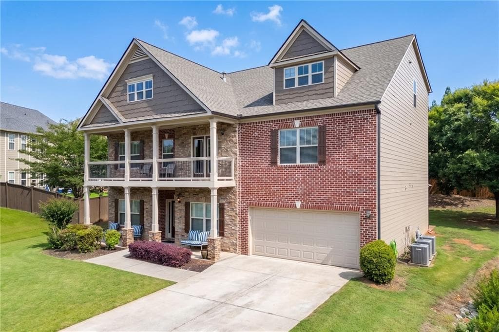 6 bedroom, 5 bathroom, 4,630 sq ft single family residence for sale at 4820 Rockingham Run, Cumming, GA 30040 — photo 2