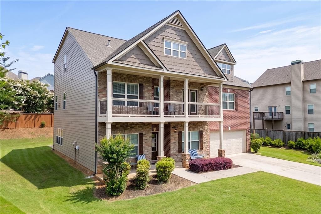 6 bedroom, 5 bathroom, 4,630 sq ft single family residence for sale at 4820 Rockingham Run, Cumming, GA 30040 — photo 3