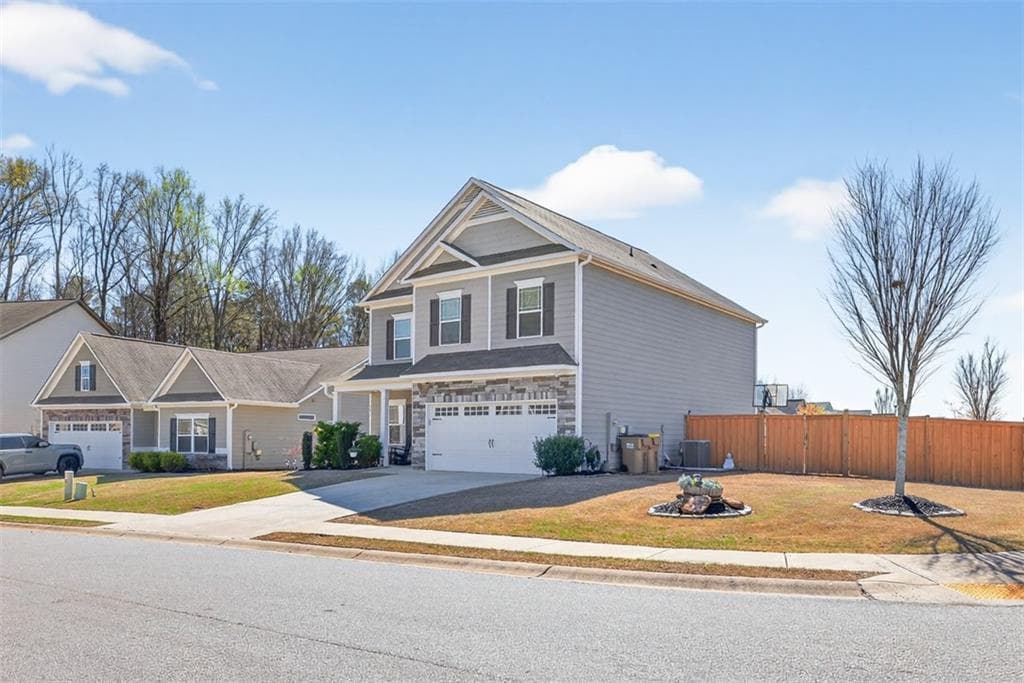 4 bedroom, 3 bathroom, 2,560 sq ft single family residence for sale at 321 Eagles Bluff Way, Hoschton, GA 30548 — photo 4