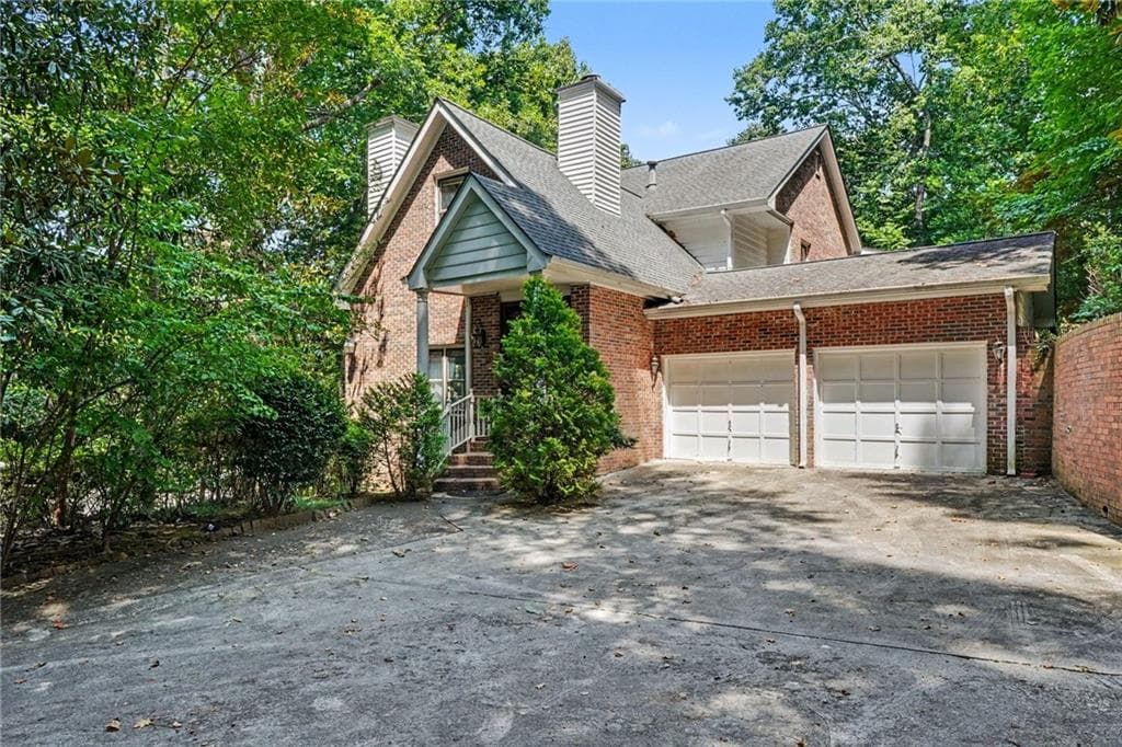 5 bedroom, 5 bathroom, 5,032 sq ft single family residence for sale at 6415 River Chase Circle, Sandy Springs, GA 30328 — photo 1 of 57