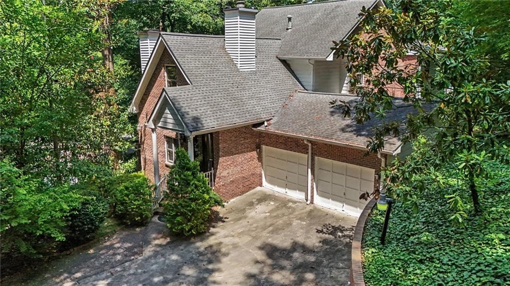 5 bedroom, 5 bathroom, 5,032 sq ft single family residence for sale at 6415 River Chase Circle, Sandy Springs, GA 30328 — photo 3
