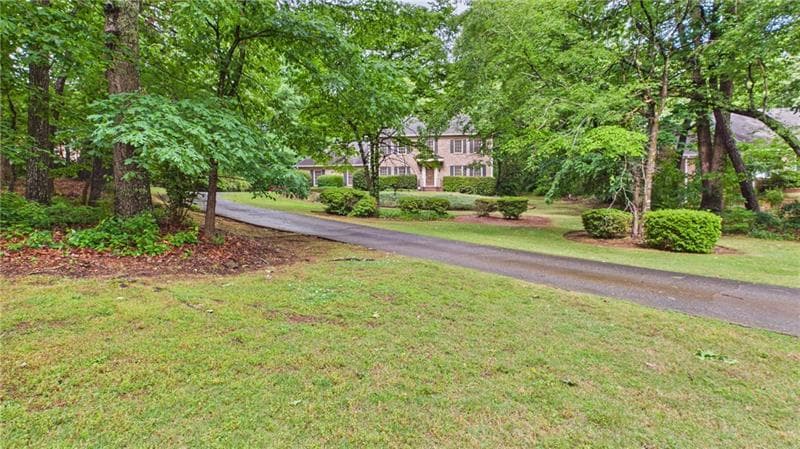 5 bedroom, 4 bathroom, 3,654 sq ft single family residence for sale at 2597 W Harvest Drive, Conyers, GA 30013 — photo 2