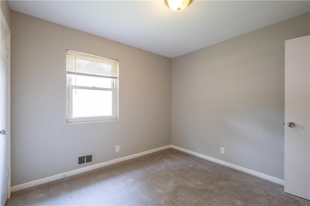 4 bedroom, 2 bathroom, 1,000 sq ft single family residence for sale at 2660 Beacon Drive, Atlanta, GA 30349 — photo 8