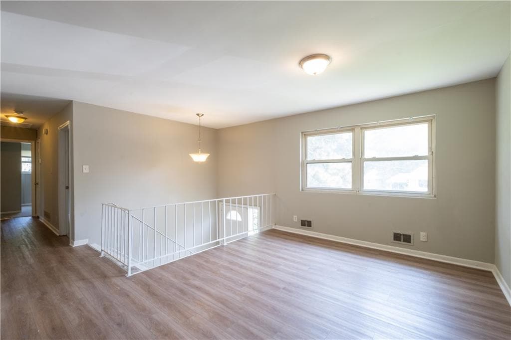 4 bedroom, 2 bathroom, 1,000 sq ft single family residence for sale at 2660 Beacon Drive, Atlanta, GA 30349 — photo 3