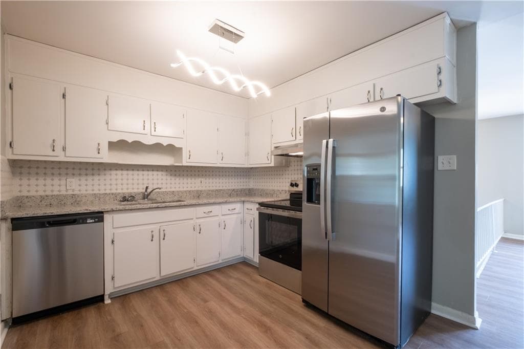 4 bedroom, 2 bathroom, 1,000 sq ft single family residence for sale at 2660 Beacon Drive, Atlanta, GA 30349 — photo 2