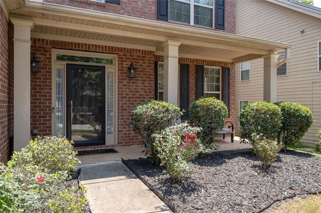 4 bedroom, 4 bathroom, 3,527 sq ft single family residence for sale at 4240 Henry Road, Snellville, GA 30039 — photo 2