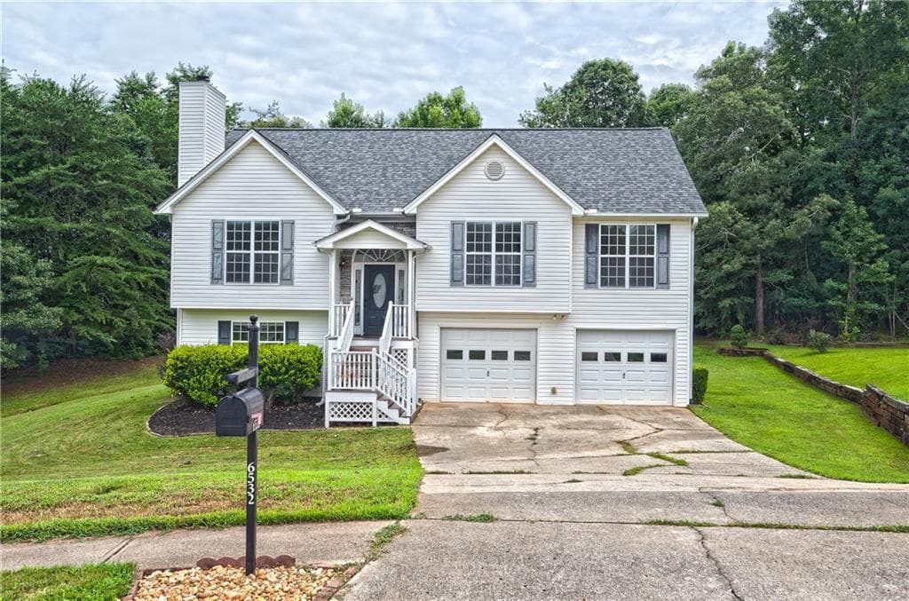 5 bedroom, 3 bathroom, 2,572 sq ft single family residence for sale at 6532 Sundial Avenue, Flowery Branch, GA 30542 — photo 1 of 63
