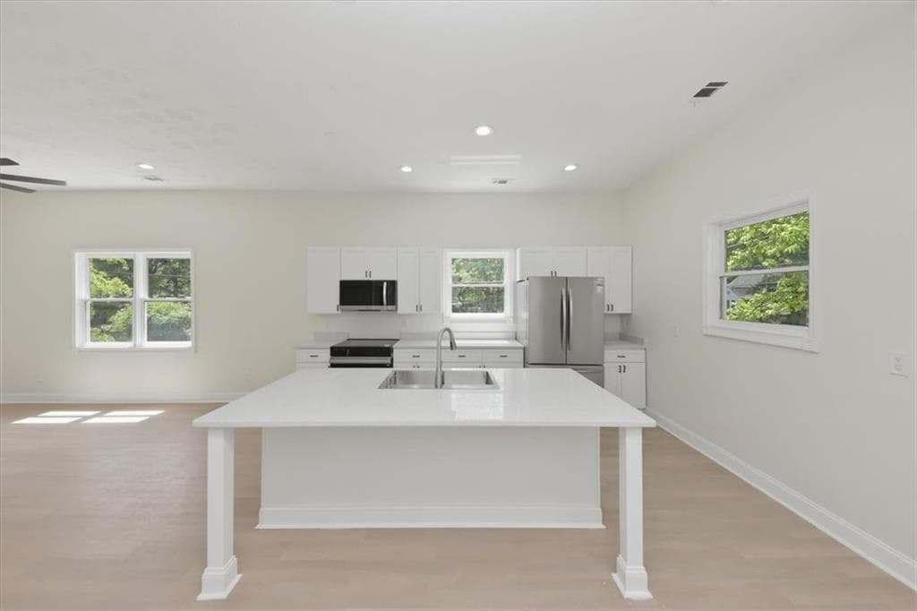 3 bedroom, 2 bathroom, 1,344 sq ft single family residence for sale at 1480 Belmont Avenue, Atlanta, GA 30310 — photo 5