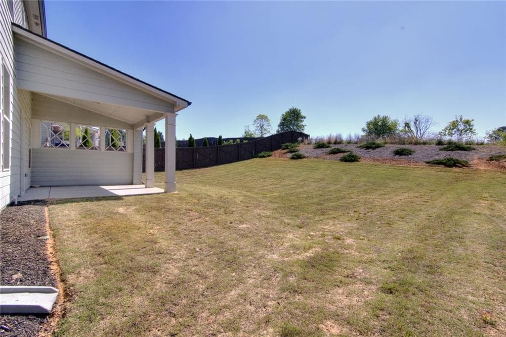 4 bedroom, 3 bathroom, 3,204 sq ft single family residence for rent at 7107 Branch Creek Cove, Flowery Branch, GA 30542 for $3,200 a month — photo 2