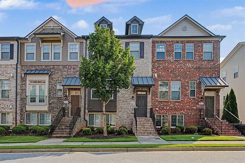 4 bedroom, 4 bathroom, 2,009 sq ft townhouse for sale at 4469 Dunblane Avenue, Sugar Hill, GA 30518
