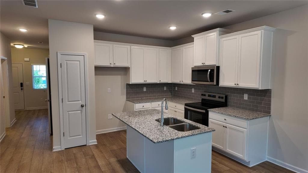 3 bedroom, 3 bathroom, 1,485 sq ft townhouse for rent at 133 Jaxton Street, Hoschton, GA 30548 for $2,500 a month — photo 3