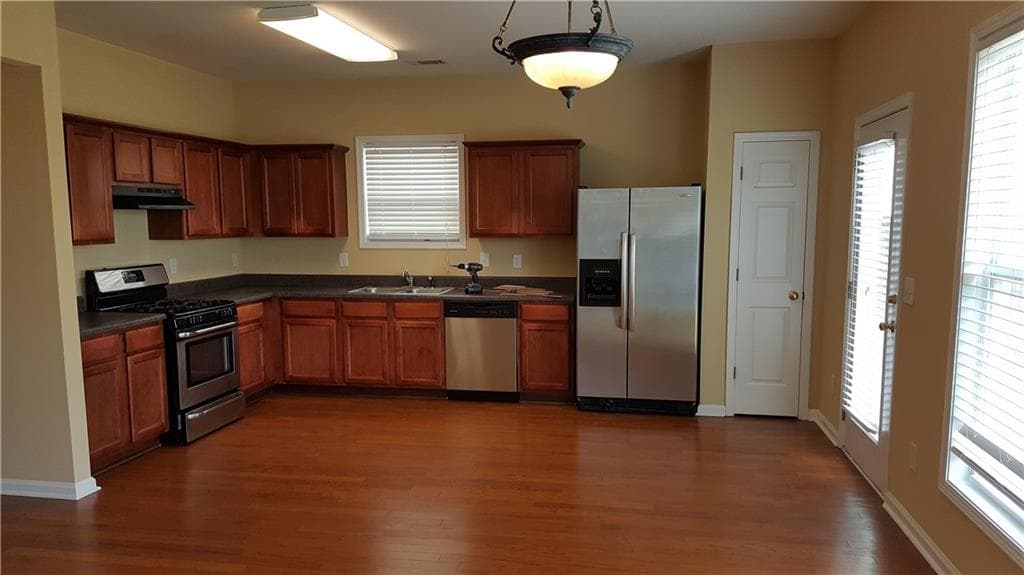 4 bedroom, 3 bathroom single family residence for rent at 2036 Executive Drive, Duluth, GA 30096 for $2,500 a month — photo 5