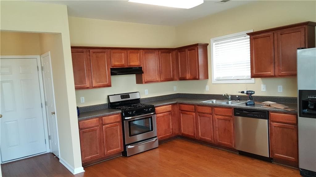 4 bedroom, 3 bathroom single family residence for rent at 2036 Executive Drive, Duluth, GA 30096 for $2,500 a month — photo 6