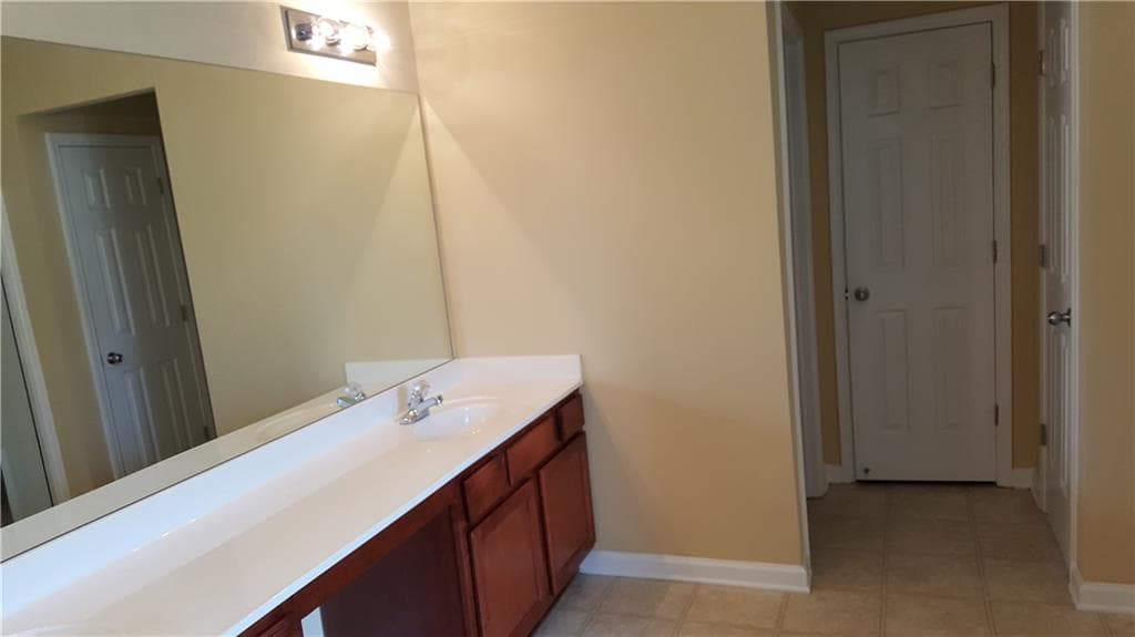 4 bedroom, 3 bathroom single family residence for rent at 2036 Executive Drive, Duluth, GA 30096 for $2,500 a month — photo 9