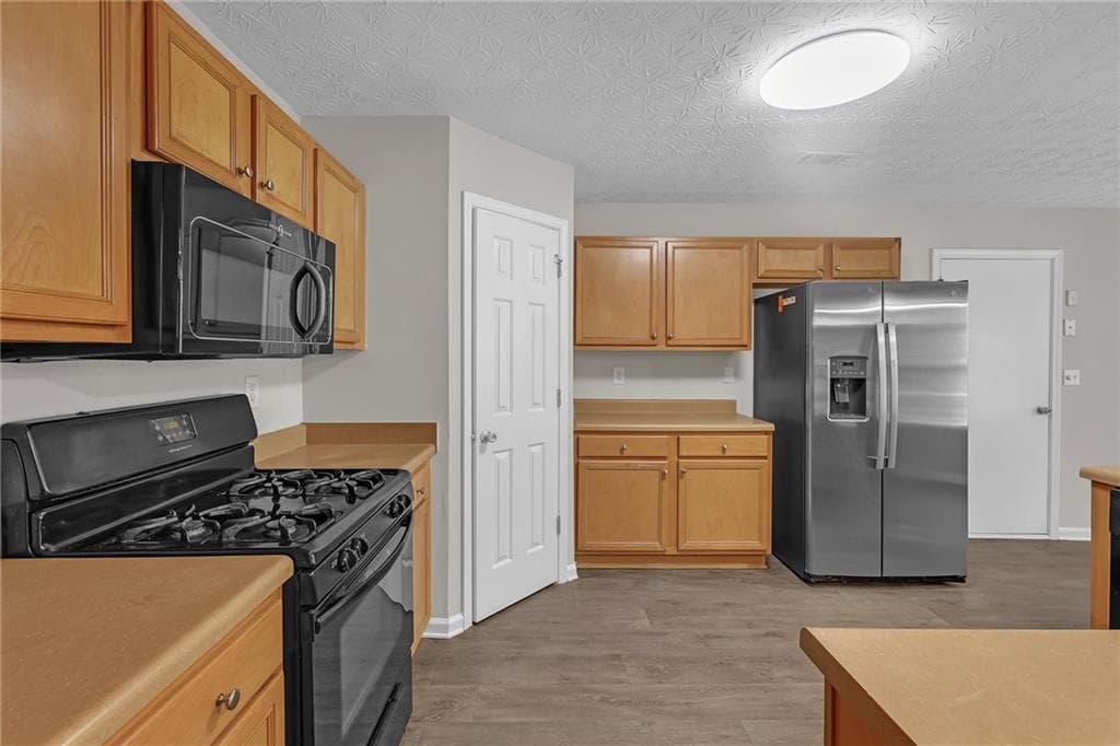 5 bedroom, 3 bathroom, 2,598 sq ft single family residence for sale at 30 EMERSON Trail, Covington, GA 30016 — photo 9