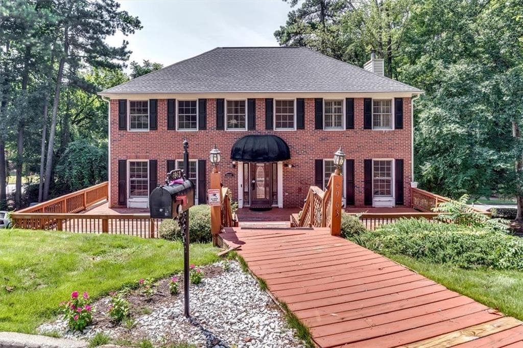 6 bedroom, 4 bathroom, 3,167 sq ft single family residence for sale at 6963 Whispering Oaks Court, Stone Mountain, GA 30087