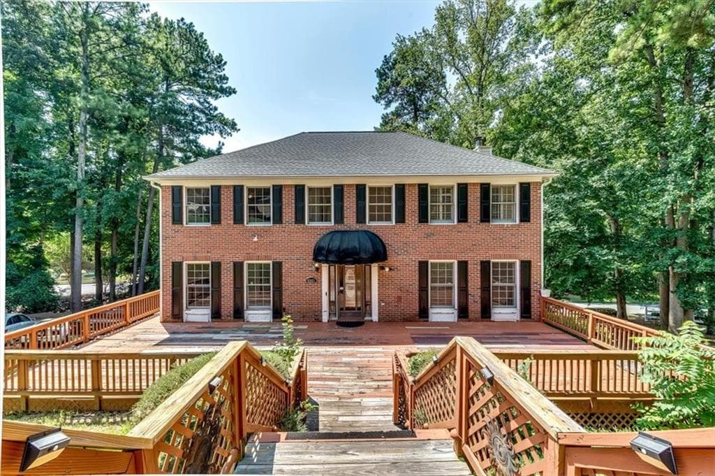 6 bedroom, 4 bathroom, 3,167 sq ft single family residence for sale at 6963 Whispering Oaks Court, Stone Mountain, GA 30087 — photo 2