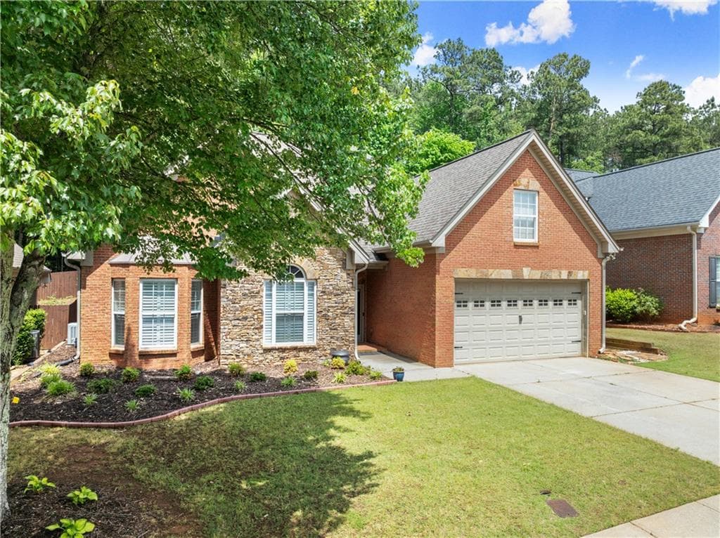 4 bedroom, 2 bathroom, 2,369 sq ft single family residence for sale at 2110 Retreat Haven Lane, Dacula, GA 30019 — photo 2